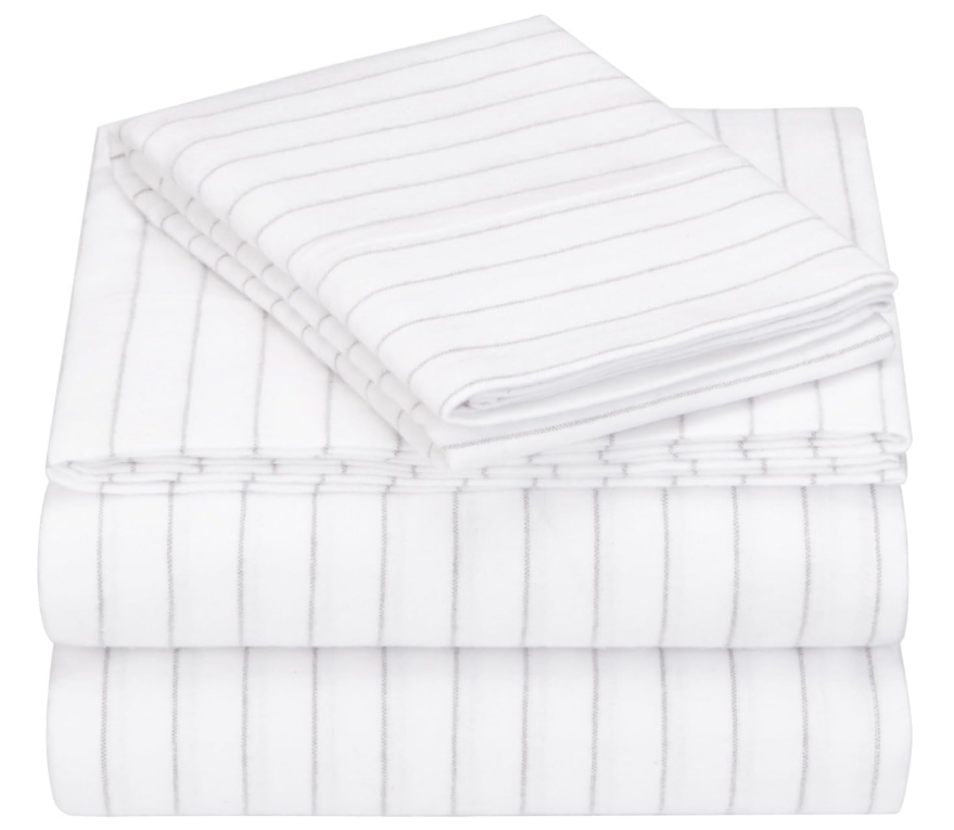 cozy winter bedroom ideas - flannel sheet set on a made bed